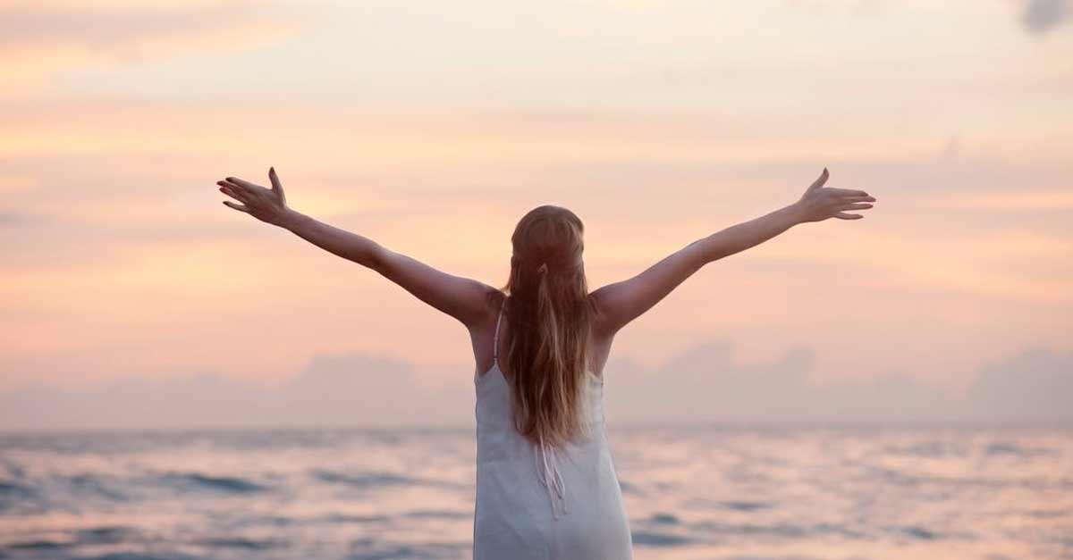 woman upstretched arms